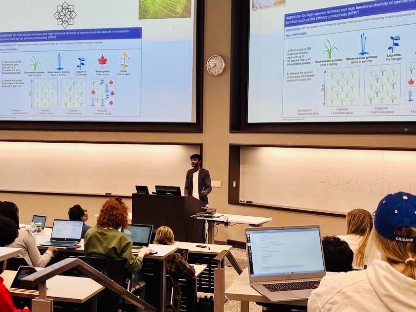 Vishal Kennedy lecturing on species richness, functional diversity, and ecological data in a university auditorium